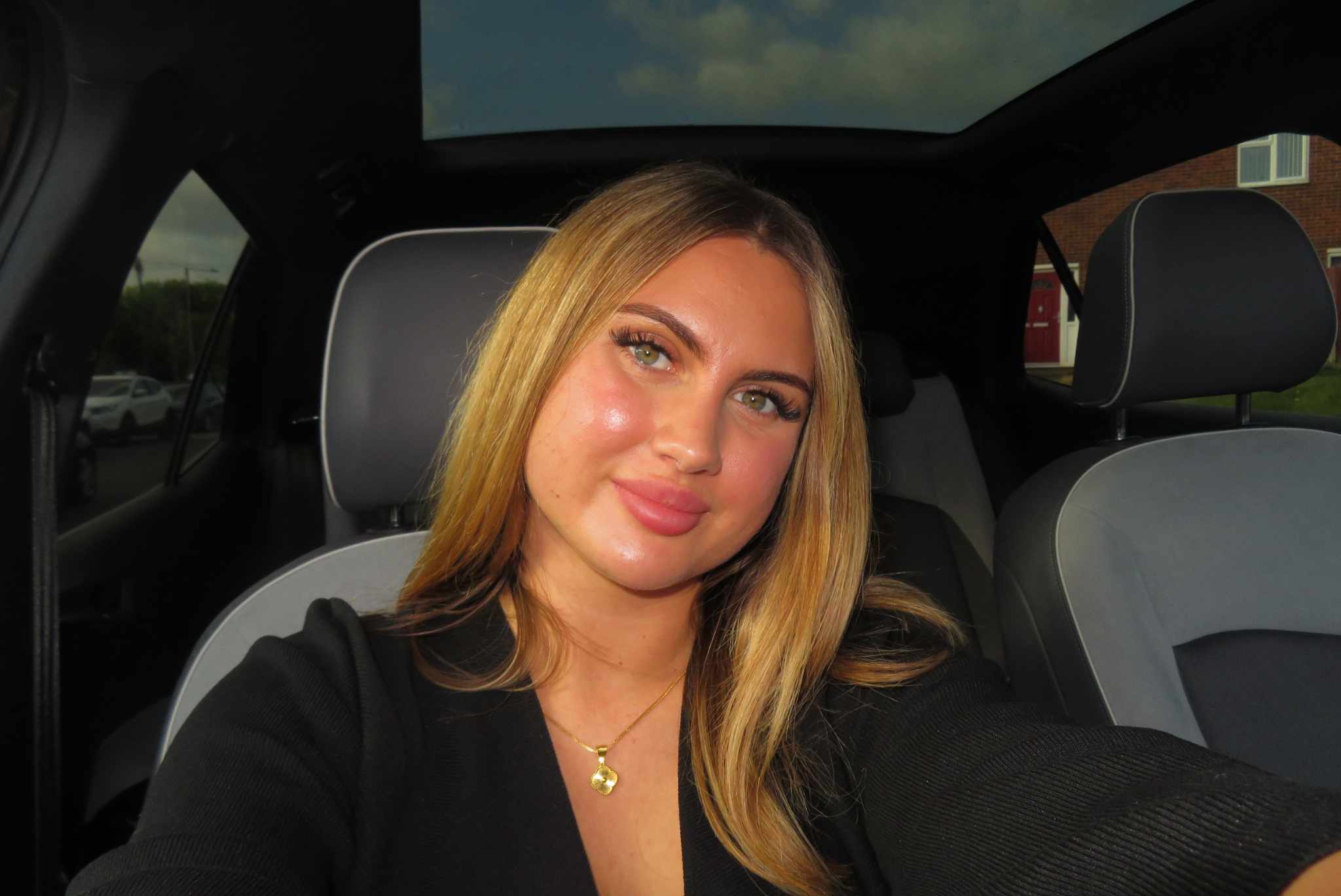 Headshot, Black top and woman smiling
